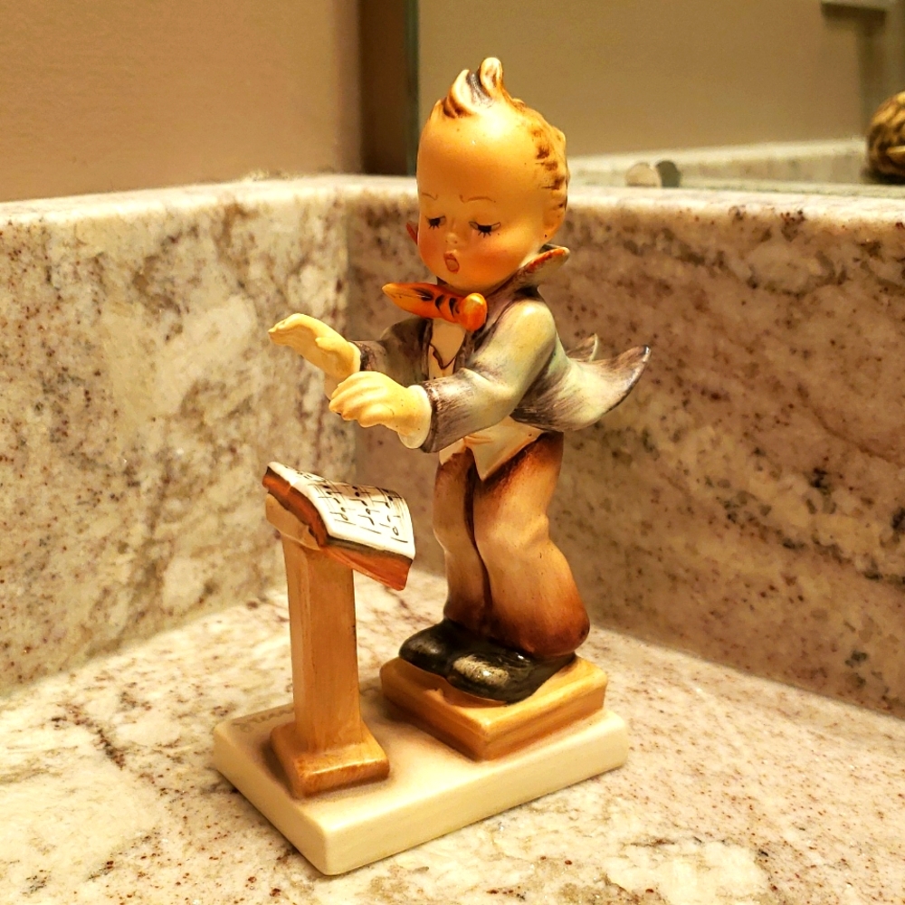 MJ Hummel figurine "Little Conductor" dated approximately 1956